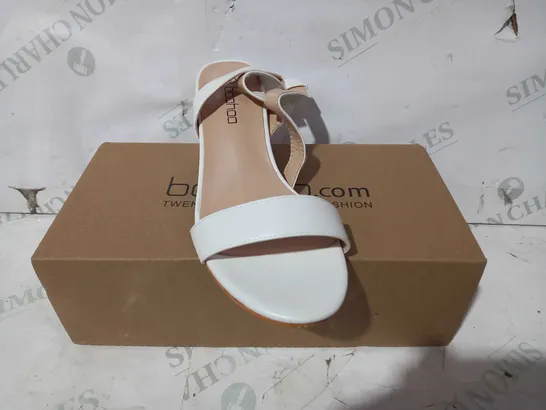 BOXED PAIR OF BOOHOO LOW BLOCK HEELS IN WHITE EU SIZE 38