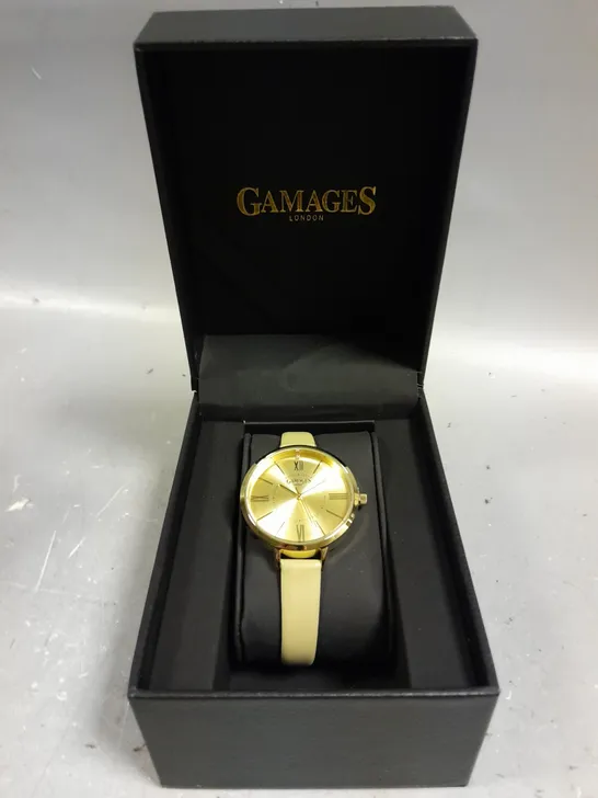 GAMAGES JUBILANT GOLD CHAMPAGNE WATCH 