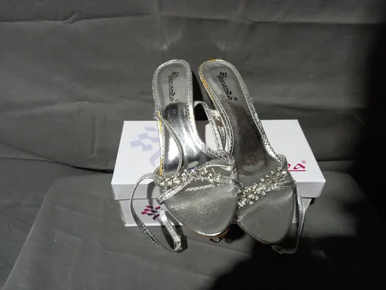 APPROXIMATELY 24 BOXED PAIRS OF LAVANDA STRAP SANDALS IN SILVER VARIOUS SIZES TO INCLUDE SIZES 37, 38, 39