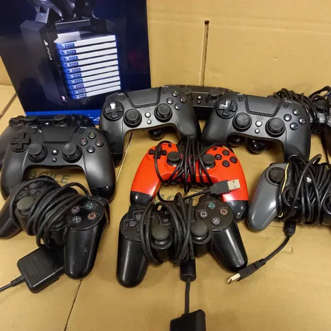 LOT OF 11 ITEMS INCLUDING 2 PS2 CONTROLLERS, 8 PS4 CONTROLLERS, PLAYSTATION GAMES TOWER WITH DUAL CHARGER