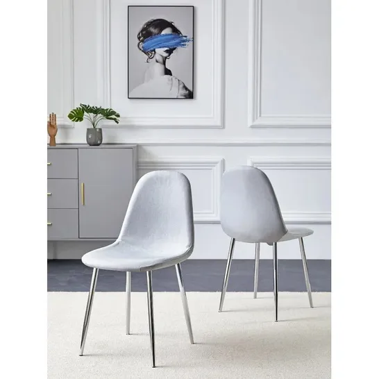 BOXED MOSE UPHOLSTERED DINING CHAIR 