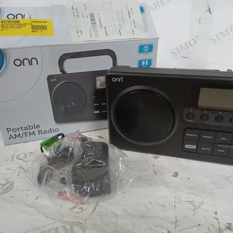 ON PORTABLE AM/FM RADIO