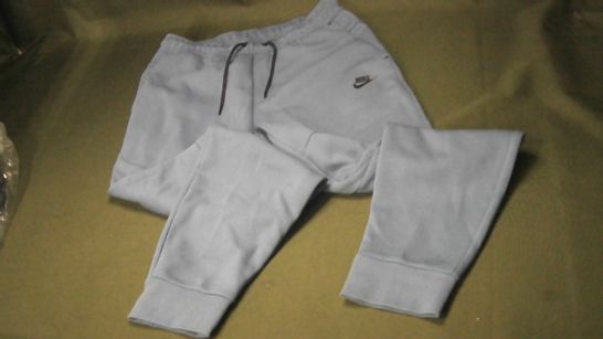 PAIR OF NIKE BLUE TRACKSUIT BOTTOMS - M