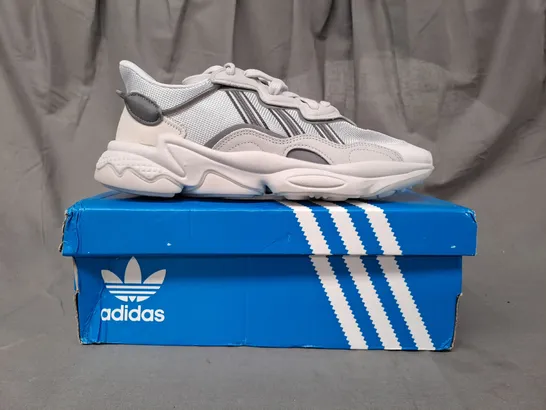 BOXED PAIR OF ADIDAS OZWEEGO SHOES IN GREY UK SIZE 9