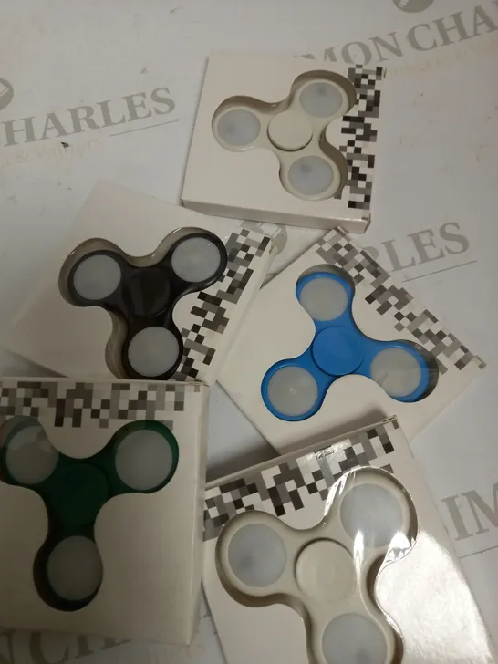 LOT OF APPROX 5 RANDOM COLOURED HAND SPINNERS