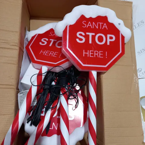 BOXED FESTIVE SET OF PRELIT SANTA STOP HERE STAKES