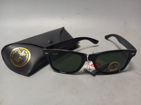 BOXED RAY-BAN SUNGLASSES IN BLACK FRAME WITH GREEN LENS