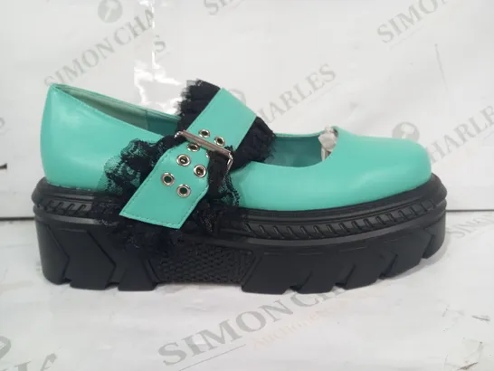 BOXED PAIR OF KOI PLATFORM SHOES IN MINT GREEN W. LACE DETAIL SIZE 9