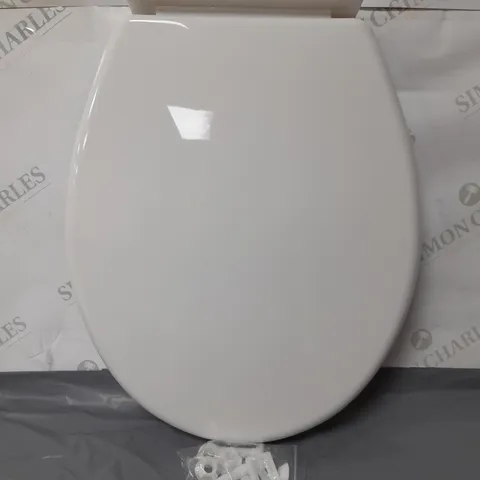 WHITE PLASTIC REQUISITE NEEDS TOILET SEAT