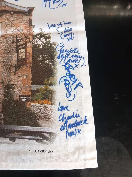 EMMERDALE'THE WOOLPACK' TEA TOWEL SIGNED BY THE CAST