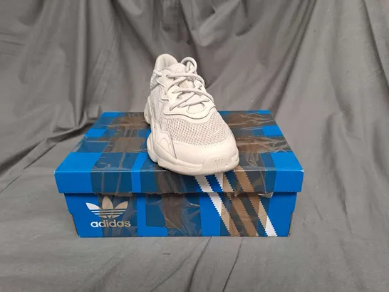 BOXED PAIR OF ADIDAS OZWEEGO TRAINERS IN VINTAGE WHITE SIZE 2