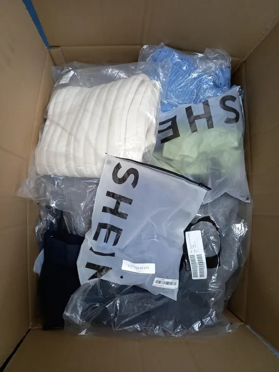 LARGE BOX OF ASSORTED CLOTHING ITEMS IN VARIOUS COLOURS AND SIZES INCLUDING TROUSERS , TOPS AND JUMPERS 