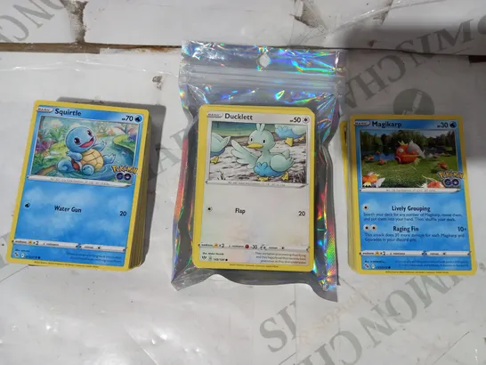 LOT OF ASSORTED POKÉMON TRADING CARDS