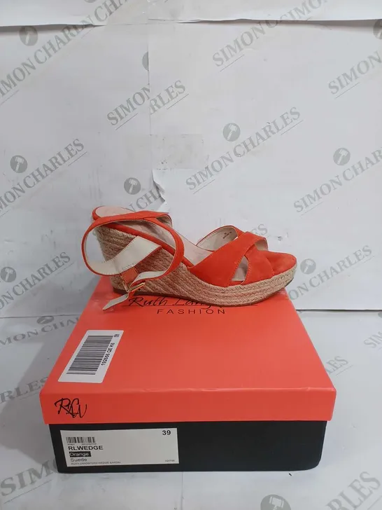 RUTH LANGSFORD WEDGE SANDAL IN ORANGE