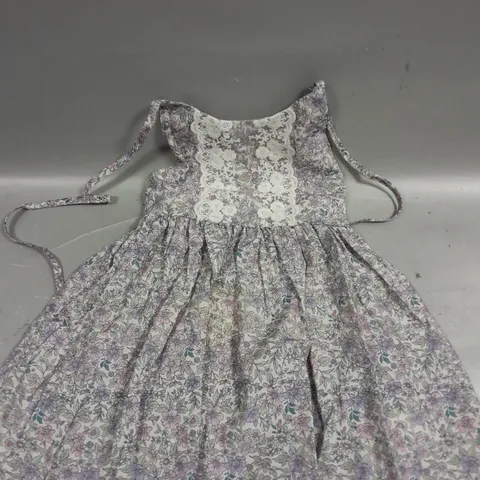 DOLLY WEARS FLORAL SLEEVELESS CHILDRENS DRESS - 5-6YRS