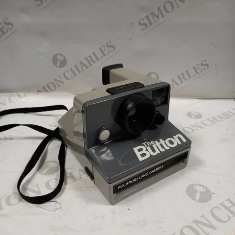 POLAROID THE BUTTON LAND CAMERA 