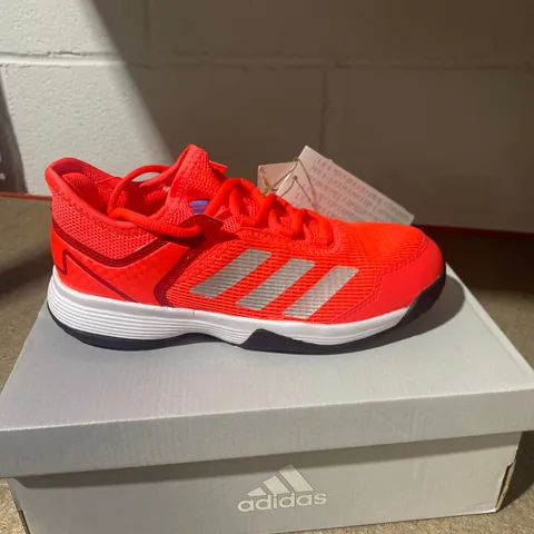 BOXED PAIR OF ADIDAS UBERSONIC 4K TRAINERS SIZE 1.5