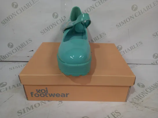 BOXED PAIR OF KOI PLATFORM BLOCK HEEL SHOES IN MINT GREEN SIZE 8