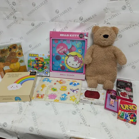 LARGE QUANTITY OF ASSORTED PRODUCTS TO INCLUDE; HELLO KITTY WALL CLOCK, JIGSAWS, HARRY POTTER QUIZ POUDLARD AND UNO