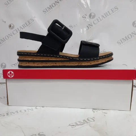 BOXED PAIR OF RIEKER WEDGE SANDALS BLACK IN SIZE 8