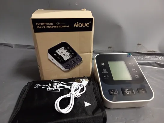 BOXED AIQUE ELECTRONIC BLOOD PRESSURE MONITOR