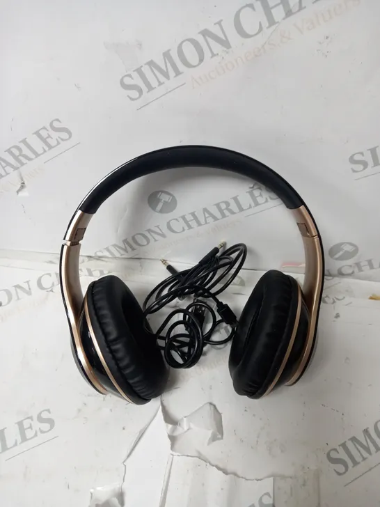 BLACK AND GOLD HEAD PHONES