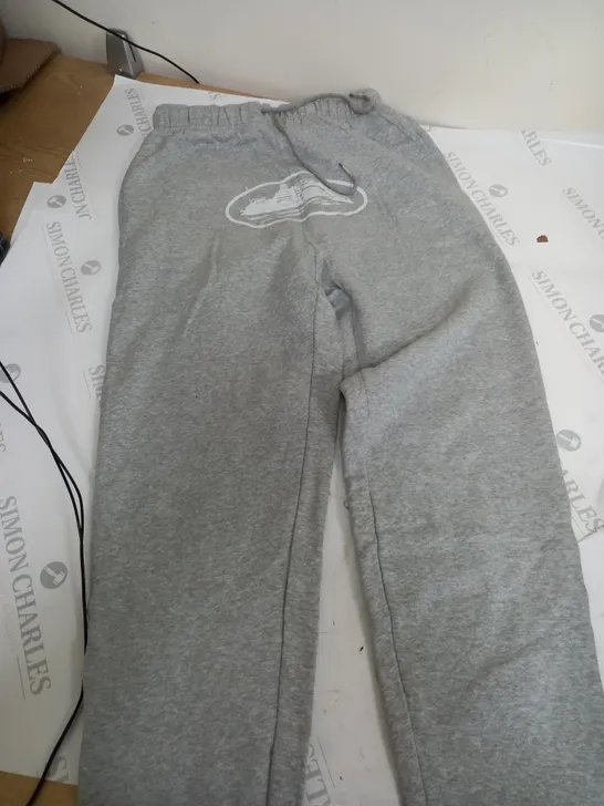 CORTEZ RULES THE WORLD LOGO PRINT TRACKSUIT BOTTOMS IN GREY - SMALL