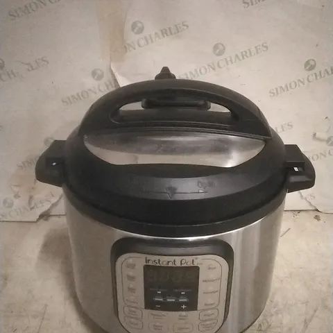 BOXED INSTANT POT DUO MULTU USE PRESSURE COOKER 