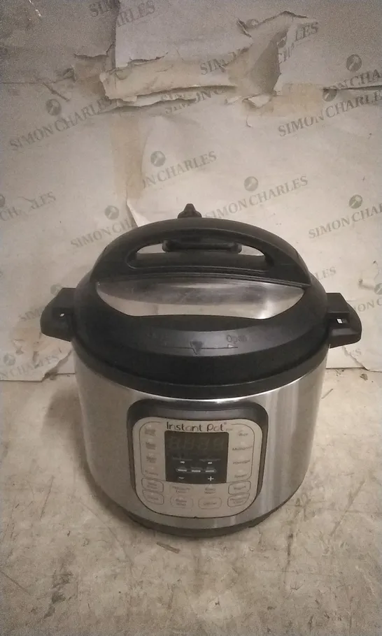 BOXED INSTANT POT DUO MULTU USE PRESSURE COOKER 