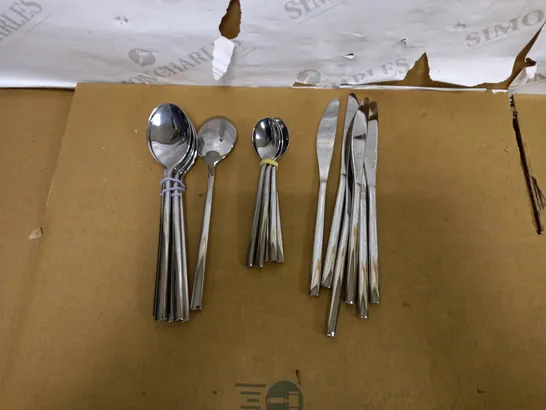 BOX OF APPROXIMATELY 6 EXZACT STAINLESS STEEL KNIVES, DESSERT SPOONS AND 5 TEASPOONS