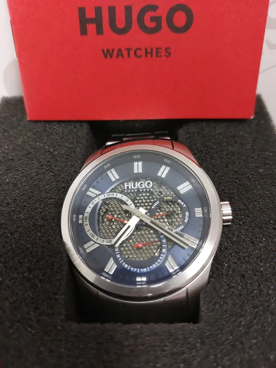 BOXED HUGO BOSS HUGO SKELETON BLUE DIAL WRIST WATCH