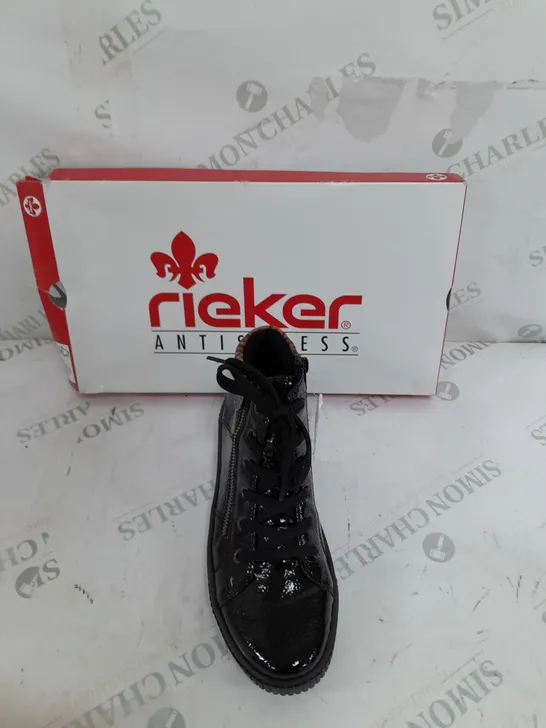 BOXED PAIR OF RIEKER HIGH TOP LEOPARD CUFF TRAINERS BLACK SIZE 5