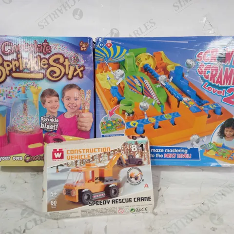 BOX OF APPROXIMATELY 15 ASSORTED TOYS AND GAMES TO INCLUDE SCREWBALL SCRAMBLE LEVEL 2, WISE BLOCK CONSTRUCTION VEHICLE, CHOCOLATE SPRINKLE STICKS, ETC