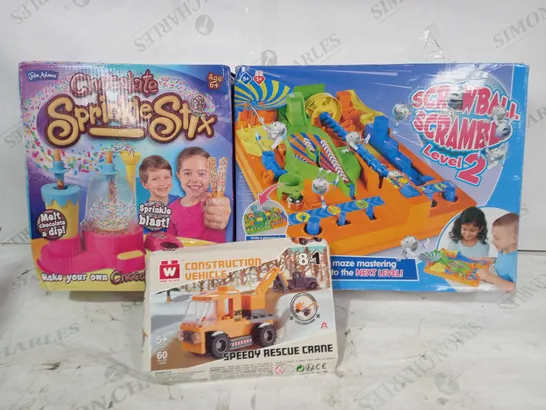 BOX OF APPROXIMATELY 15 ASSORTED TOYS AND GAMES TO INCLUDE SCREWBALL SCRAMBLE LEVEL 2, WISE BLOCK CONSTRUCTION VEHICLE, CHOCOLATE SPRINKLE STICKS, ETC