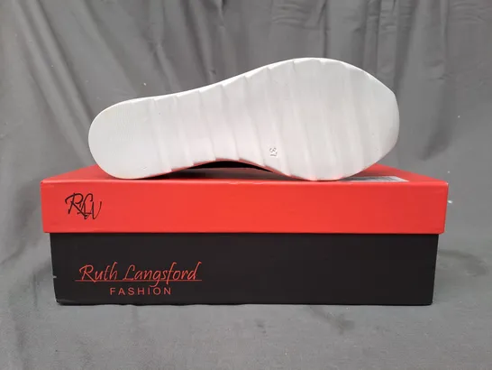 BOXED PAIR OF RUTH LANGSFORD WEDGE TRAINERS IN BLACK SIZE 4