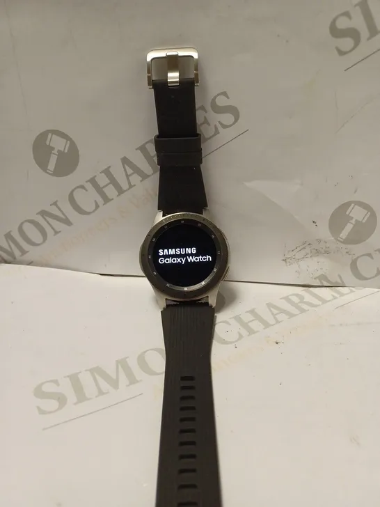 SAMUNG GALAXY WATCH IN SILVER WITH BLACK STRAP