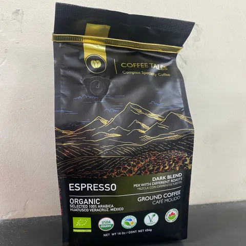 BOX OF 16 PACKS OF BRAND NEW COFFEE TALES ESPRESSO DARK BLEND GROUND COFFEE (Each pack net weight 16oz)