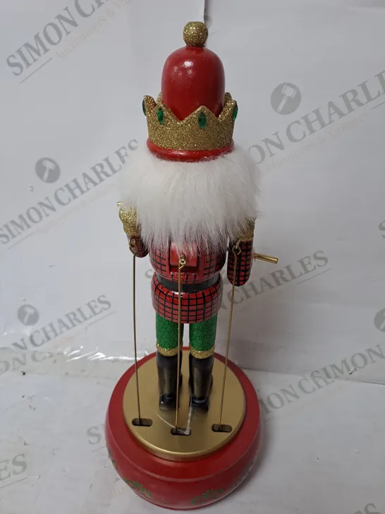 BOXED OUTLET 32CM WOODEN ANIMATED MUSICAL NUTCRACKER