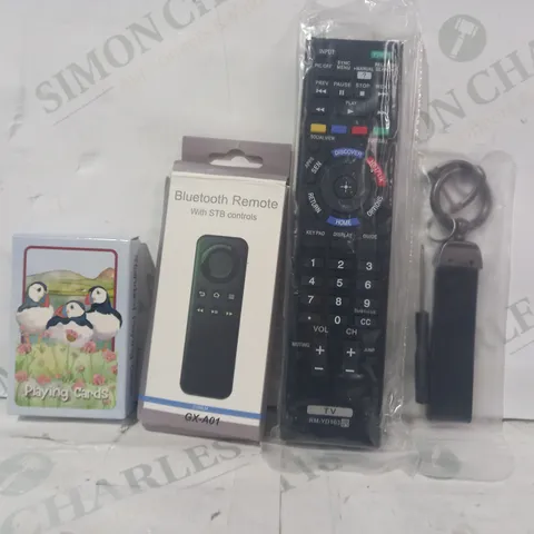 LOT OF APPROXIMATELY 15 ASSORTED HOUSEHOLD ITEMS TO INCLUDE TV REMOTE, BLUETOOTH REMOTE WITH STB CONTROLS, PLAYING CARDS, ETC