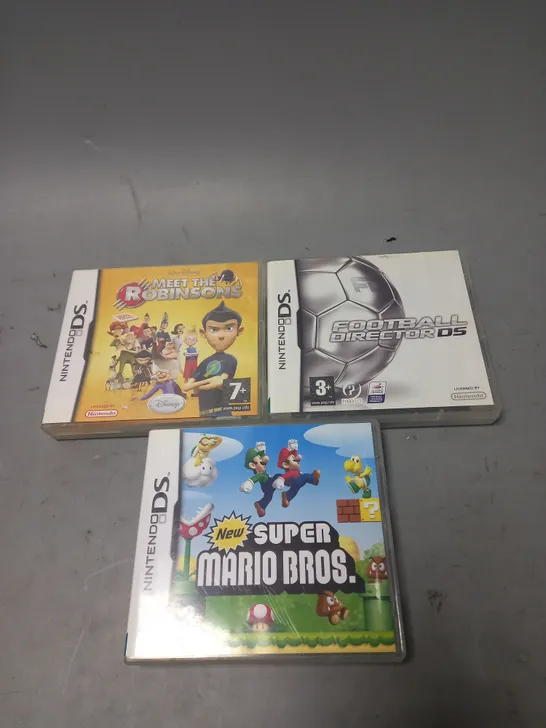 LOT OF 3 NINTENDO DS GAMES TO INCLUDE SUPER MARIO BROS AND MEET THE ROBINSONS ETC