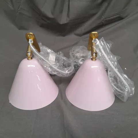 BOXED SET OF TWO PLUG IN WALL LIGHTS WITH GOLD METAL FIXTURES IN LIGHT PINK