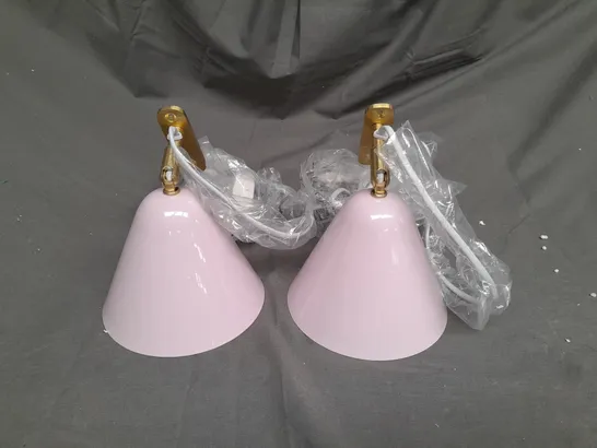 BOXED SET OF TWO PLUG IN WALL LIGHTS WITH GOLD METAL FIXTURES IN LIGHT PINK