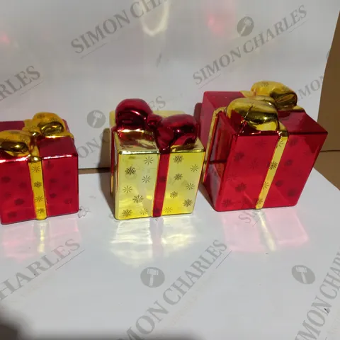 SANTA EXPRESS PRE-LIT SET OF GLASS PRESENTS IN RED AND GOLD 