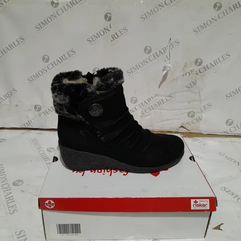 BOXED PAIR OF RIEKER BLACK WEDGE ANKLE BOOTS WITH FAUX FUR TRIM - SIZE 6