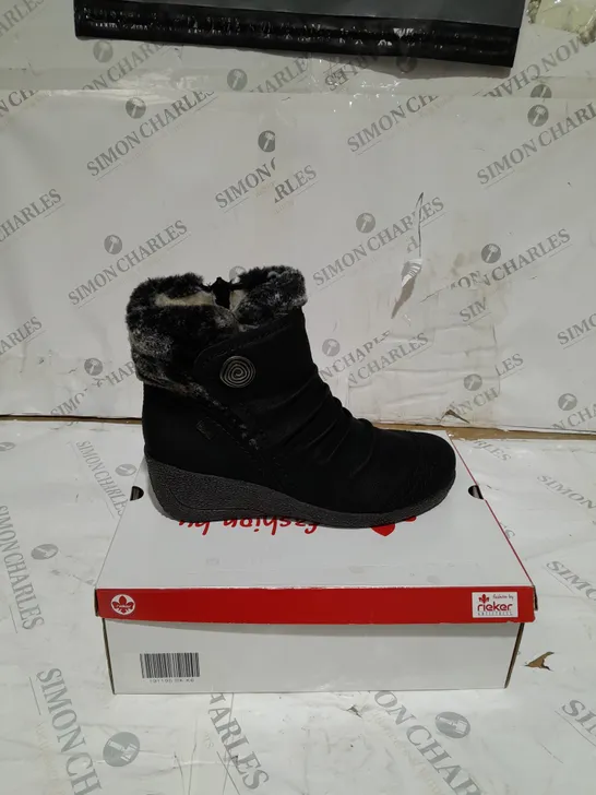 BOXED PAIR OF RIEKER BLACK WEDGE ANKLE BOOTS WITH FAUX FUR TRIM - SIZE 6