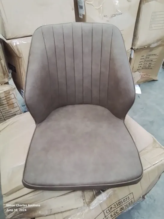 A BOXED PAIR OF BROWN FAUX LEATHER UPHOLSTERED SIDE CHAIRS 