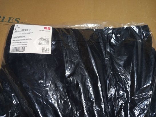PACKAGED UNIQLO NAVY SMART ANKLE TROUSERS - LARGE