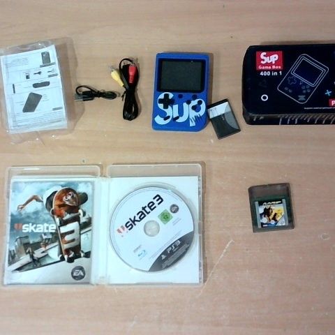 LOT OF 3 ASSORTED CONSOLE ITEMS TO INCLUDE SUP GAMEBOX, SKATE 3 PS3 GAME AND 007 THE WORLD IS NOT ENOUGH GAMEBOY GAME
