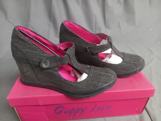 BOX OF APPROXIMATELY 10 BLACK  GUPPY LOVE BY BLOWFISH SHOES IN VARIOUS SIZES 