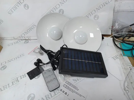 TWO SOLAR POWERED LIGHTS AND REMOTE